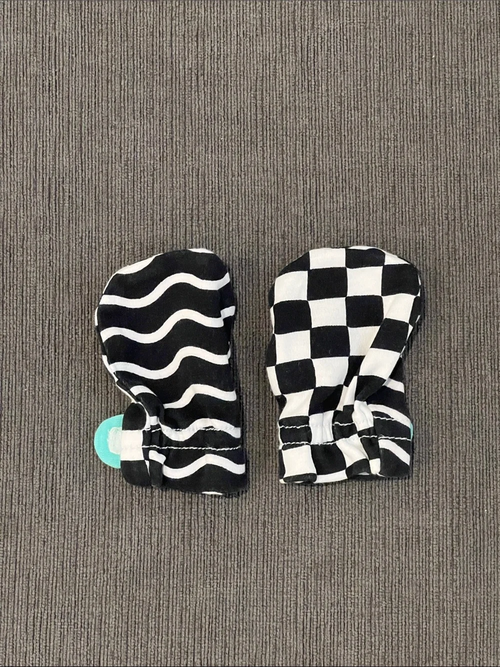 Lovevery Baby Black & White Patterned Mittens with Teal Strap Like New